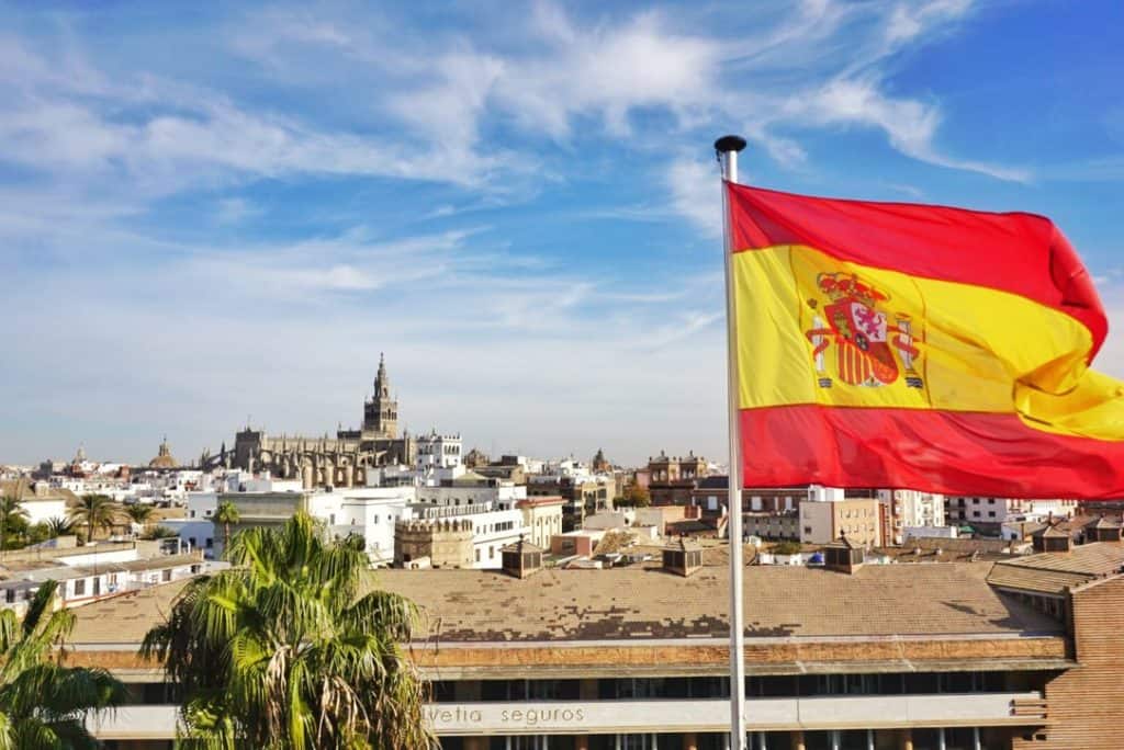 Seville Spain - Spanish flag and Seville skyline