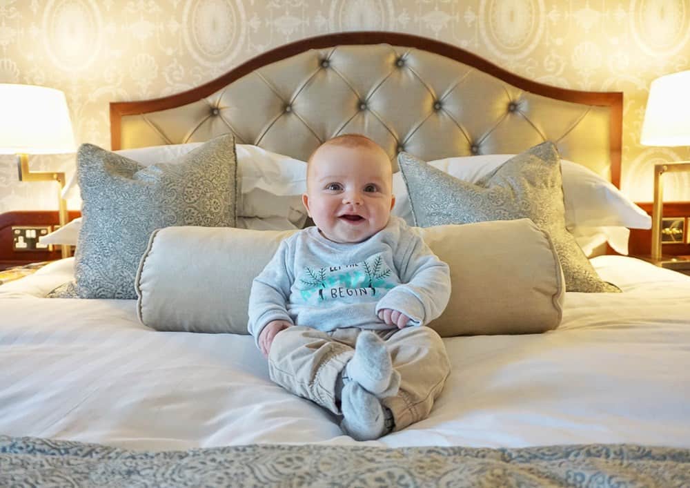 Baby on Hotel Bed