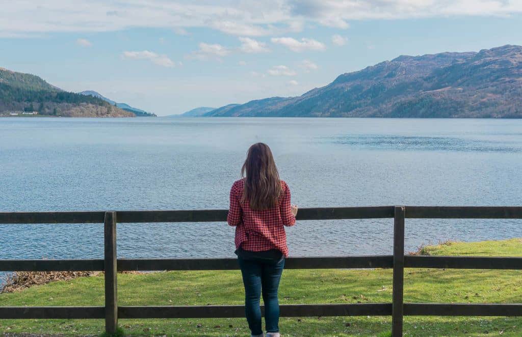 Moving Overseas Alone - Standing at fence at Loch Ness