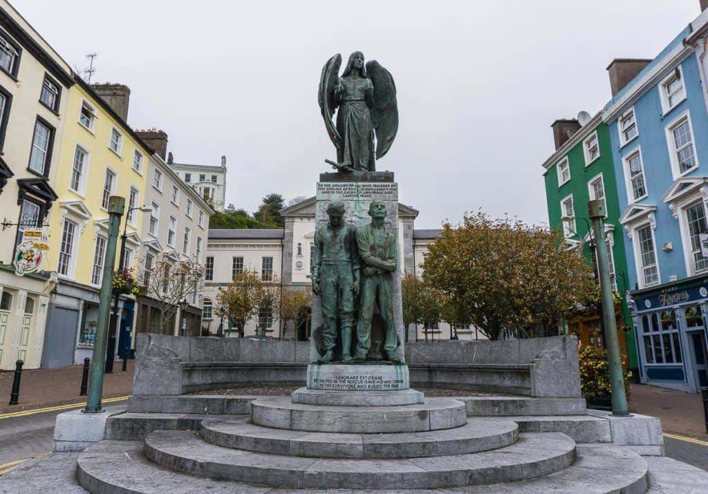 Colourful buildings with statue in Cobh. 