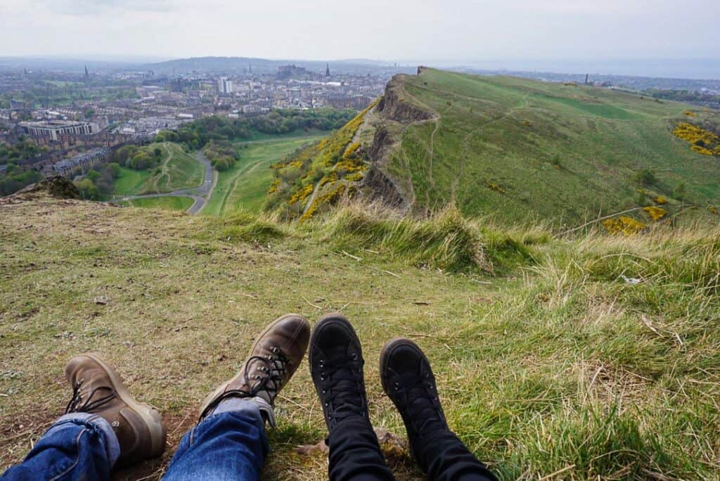 Starting a Business in 2020 -  Couples shoes and view of Salisbury Cargs and Edinburgh city from above