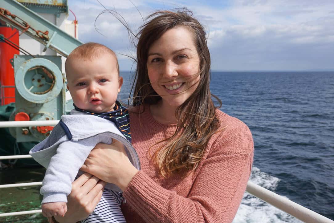 Mum and Baby on ferry with sea