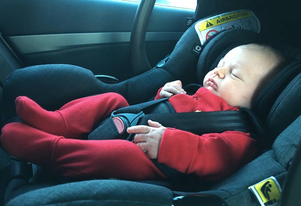 Baby asleep in car seat