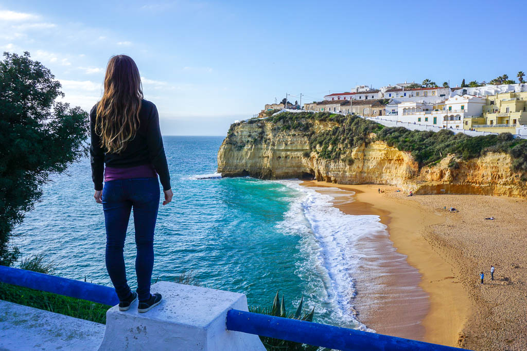 Standing overlooking Carvoerio beach Portugal