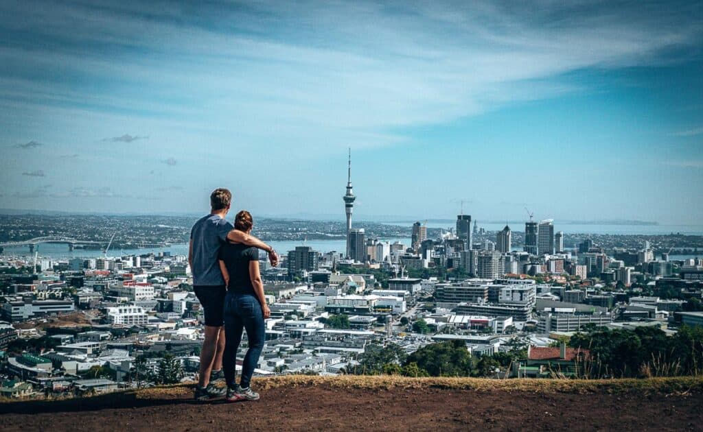 Couples Long Term Travel - Couple overlooking Auckland City New Zealand skyline