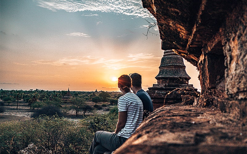 Couples Long Term Travel - Couple on temple at Sunrise in Bagan