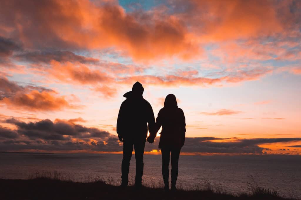 Romantic Places in the USA - Couple watching sunset