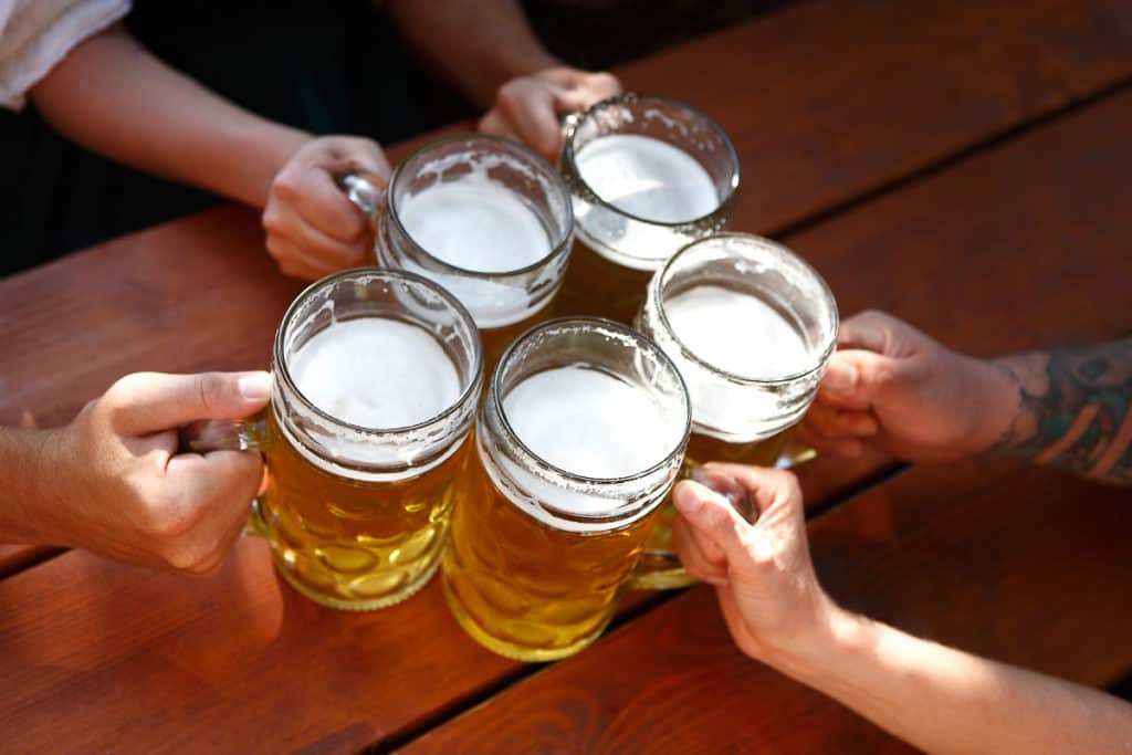 Cheers with Beer in a Beer Garden in Edinburgh