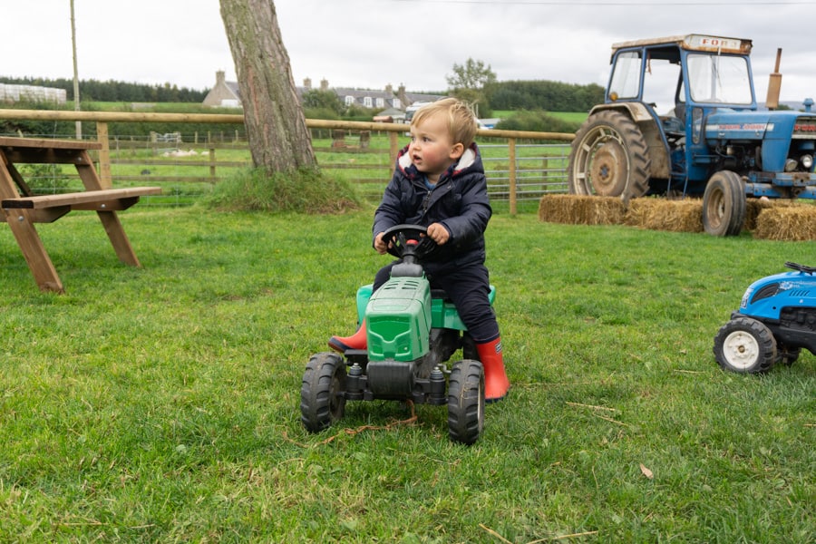 Jacksons at Jedburgh - Toddler on a tractor