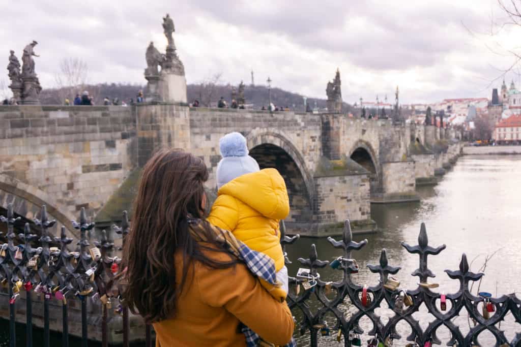 Starting a Business in 2020 - Mum and baby overlooking Charles Bridge in Prague