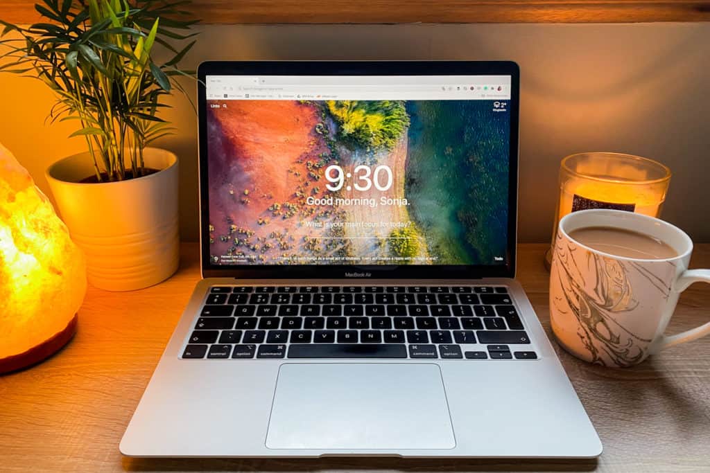 Starting a Business in 2020 - Laptop, plant, salt lamp, candle and cup of tea