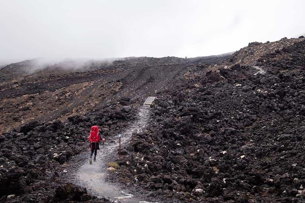 Hiking in New Zesland - volcanic rock track